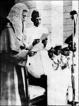 Quaid-i-Azam being administered the oath of office of the Governor General by the Chief Justice of Pakistan